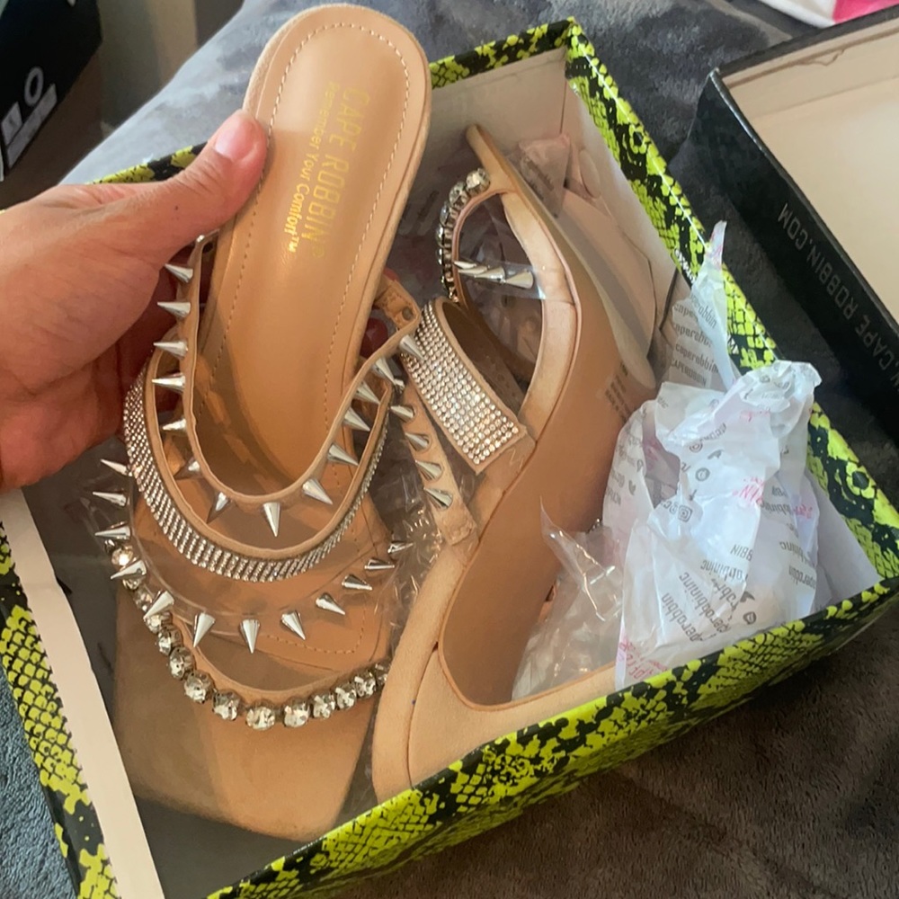 Nude spiked heels